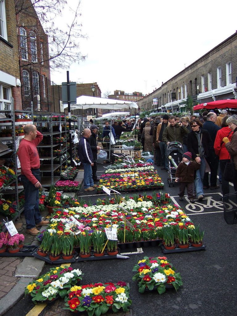 Columbia Road Flower Market in London. Photo Credit: © Edward Betts via Wikimedia Commons.